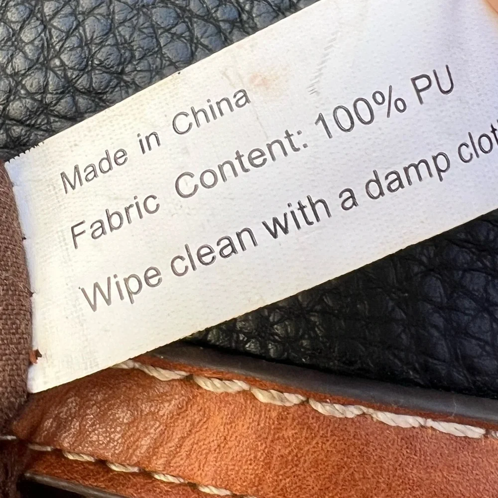B.O.C. Born Concept Black Leather Handbag with Brown Accents